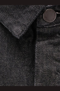 Entire studios women’s black denim shirt jacket featuring a circular metal button engraved with acne studios