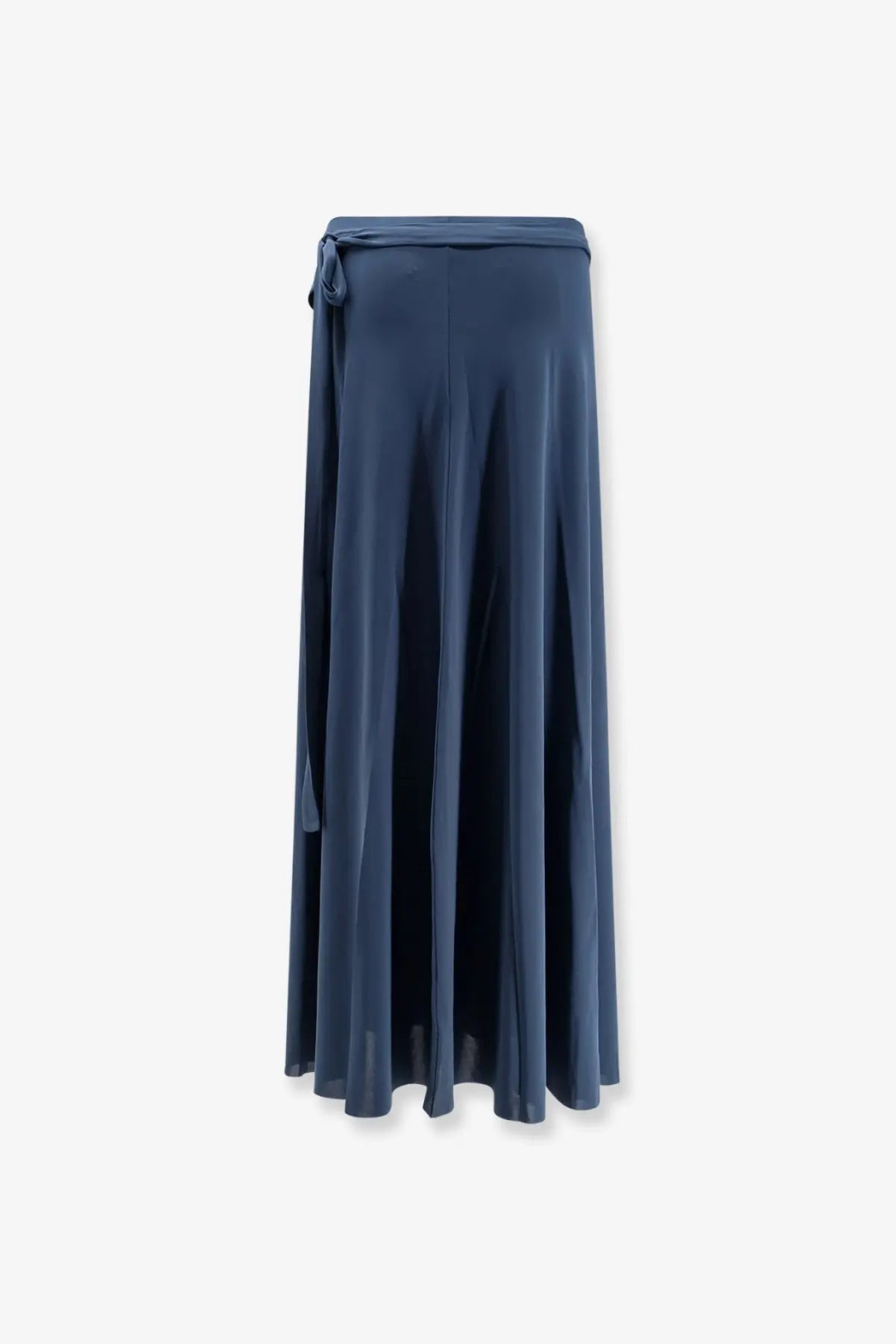 A navy blue satin wrap skirt by eres with a tied waistband and flowing pleated fabric called Julieta Jersey Pareo Skirt