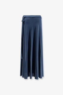 A navy blue satin wrap skirt by eres with a tied waistband and flowing pleated fabric called Julieta Jersey Pareo Skirt