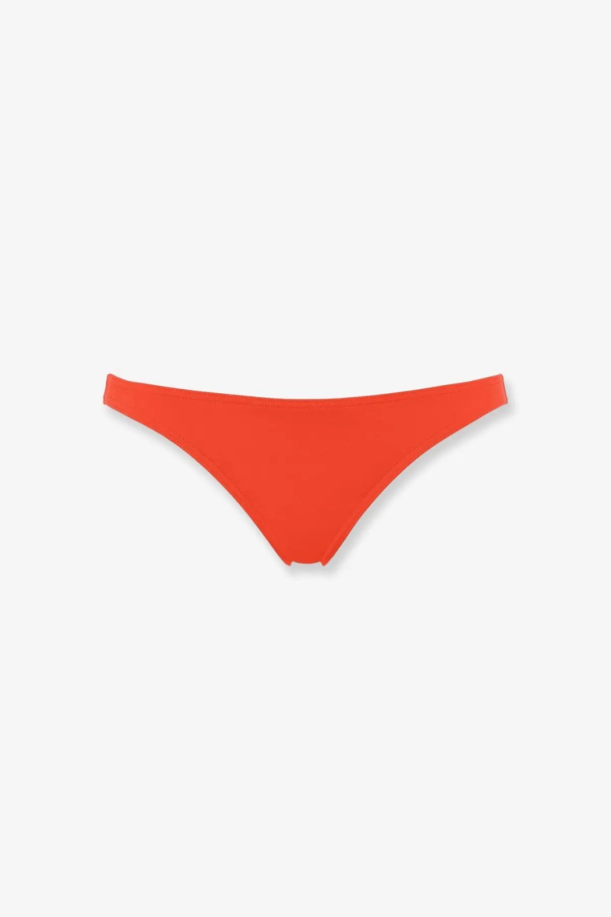 Bright orange Eres women’s lycra bikini bottom with a smooth seamless design shown from the front side
