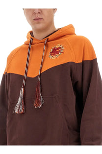 Etro men’s hooded sweatshirt orange with orange and brown color-block, embroidered crest, and braided tassel drawstrings