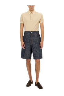 Etro men’s jacquard denim bermuda shorts in dark blue featuring an intricate paisley pattern on denim fabric