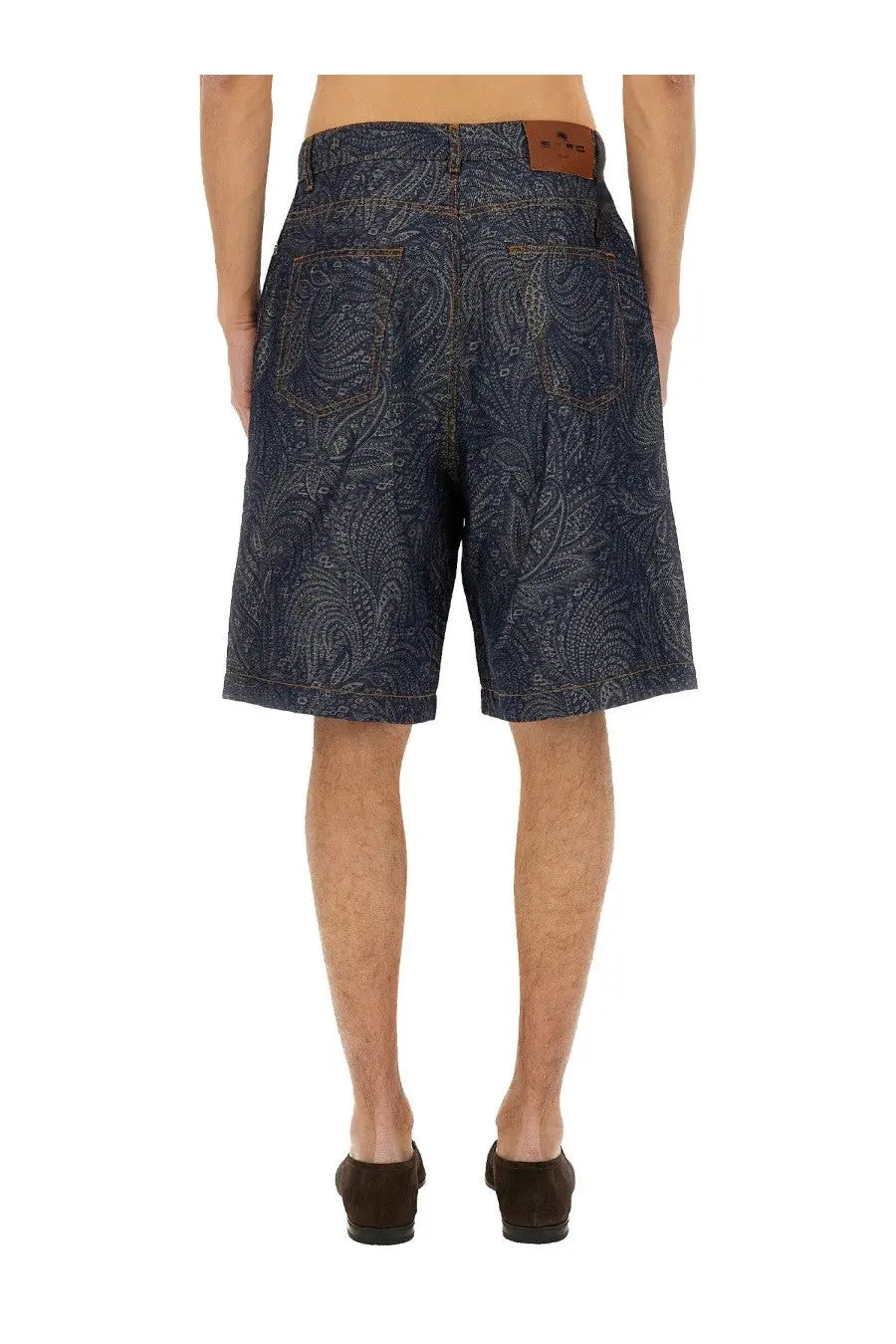 Dark blue ETRO men’s jacquard denim bermuda shorts with intricate paisley pattern and brown leather waistband patch