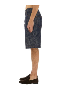 Dark blue etro men’s jacquard denim bermuda shorts featuring an intricate paisley pattern on fabric
