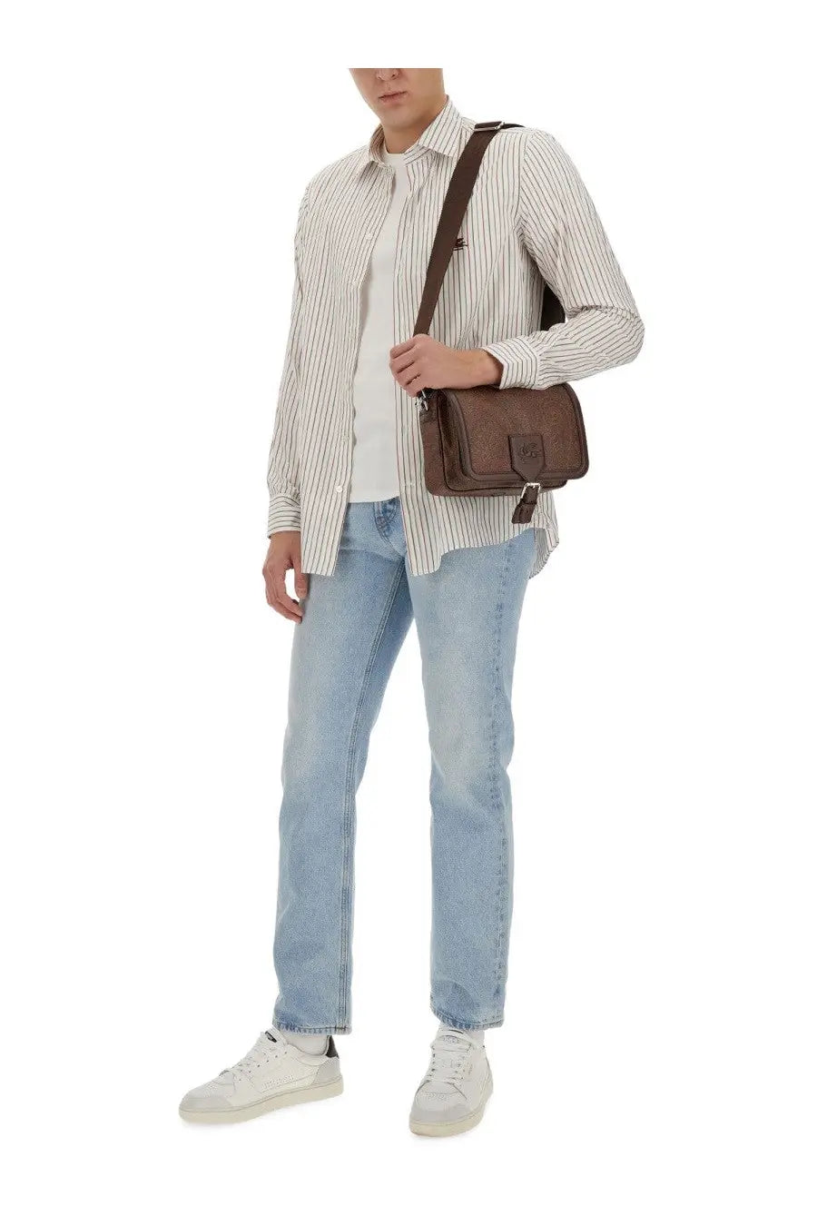 Brown leather crossbody bag with flap closure and small logo patch paired with etro men’s pegasus white shirt