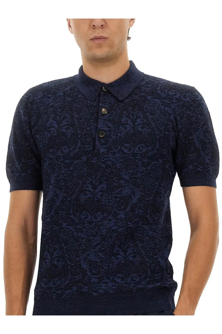 Etro men’s dark blue knit polo shirt with intricate raised paisley pattern across the fabric