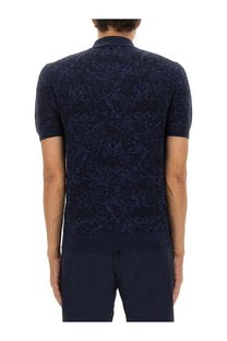 Navy blue short-sleeved knit polo shirt with intricate dark pattern by ETRO for men in a stylish casual design