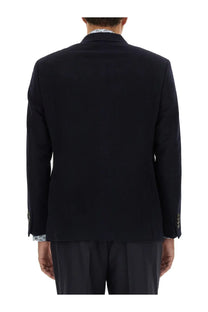 Etro men’s single breasted blue jacket with subtle texture and gold toned buttonhole cuff detailing