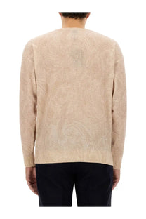 Etro men’s wool jersey beige paisley patterned knit sweater with ribbed cuffs and hem in white background