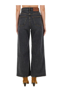 Etro women’s baggy jacquard jeans grey showing dark-wash denim wide-leg trousers with brown leather brand patch at waistband back view