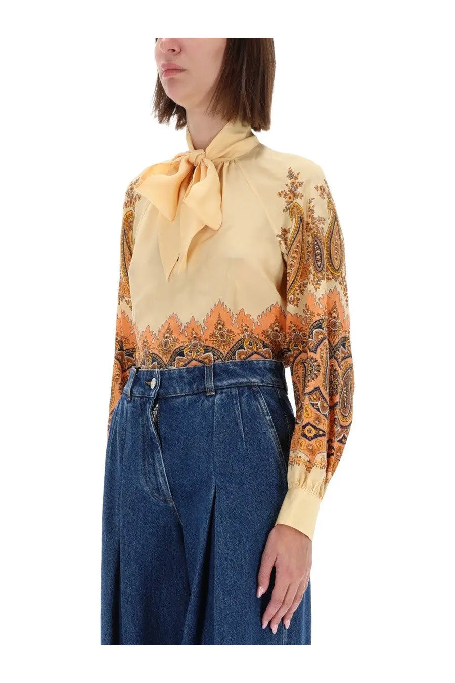 Etro women’s long-sleeved yellow blouse with intricate paisley and geometric pattern and matching tied necktie