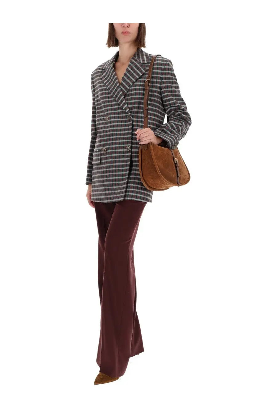 Brown suede shoulder bag with curved top and front zipper closure paired with etro women’s grey double breasted jacket