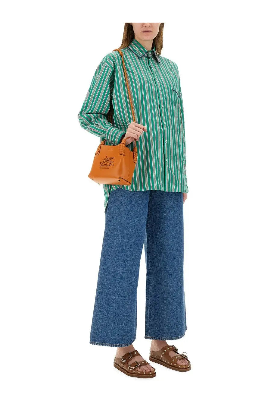 Tan leather crossbody bag with stitched logo front paired with etro women’s jacquard green shirt