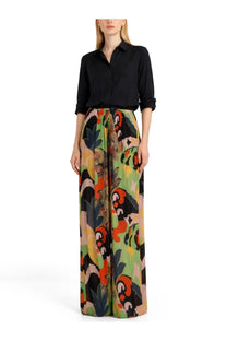 Etro women’s pantalone con stampa multicolor paired with a black button-down shirt with rolled sleeves in cotton blend