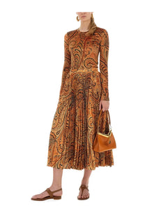Etro women’s pleated sablé skirt in orange with a rich paisley print and fitted bodice midi dress style