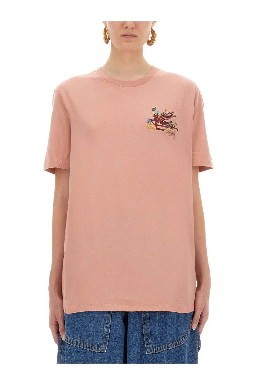 A soft pink short-sleeved shirt from etro featuring a colorful embroidered graphic on the chest