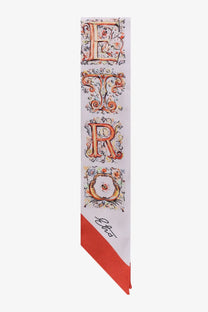 Etro women’s silk bandeau gold featuring a white silk scarf with gold and orange vintage lettering and a red triangular band