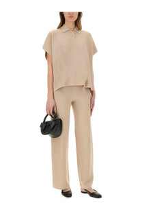 Beige short-sleeved polo shirt with relaxed draped silhouette and subtle texture paired with Fabiana Filippi organic cotton lurex pants