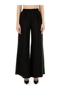 Fabiana Filippi women’s black wide-leg pants with high-waisted elastic band and flowing smooth fabric