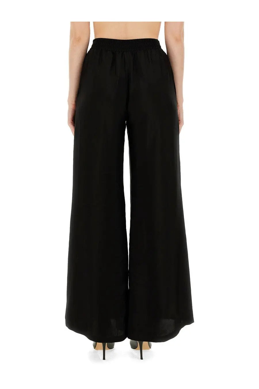 Fabiana Filippi women’s wide leg pants in black soft flowing fabric with elastic waistband for comfortable wear