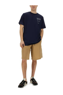 Navy blue short-sleeved t-shirt with white text on the chest from Family First mens Bermuda beige collection