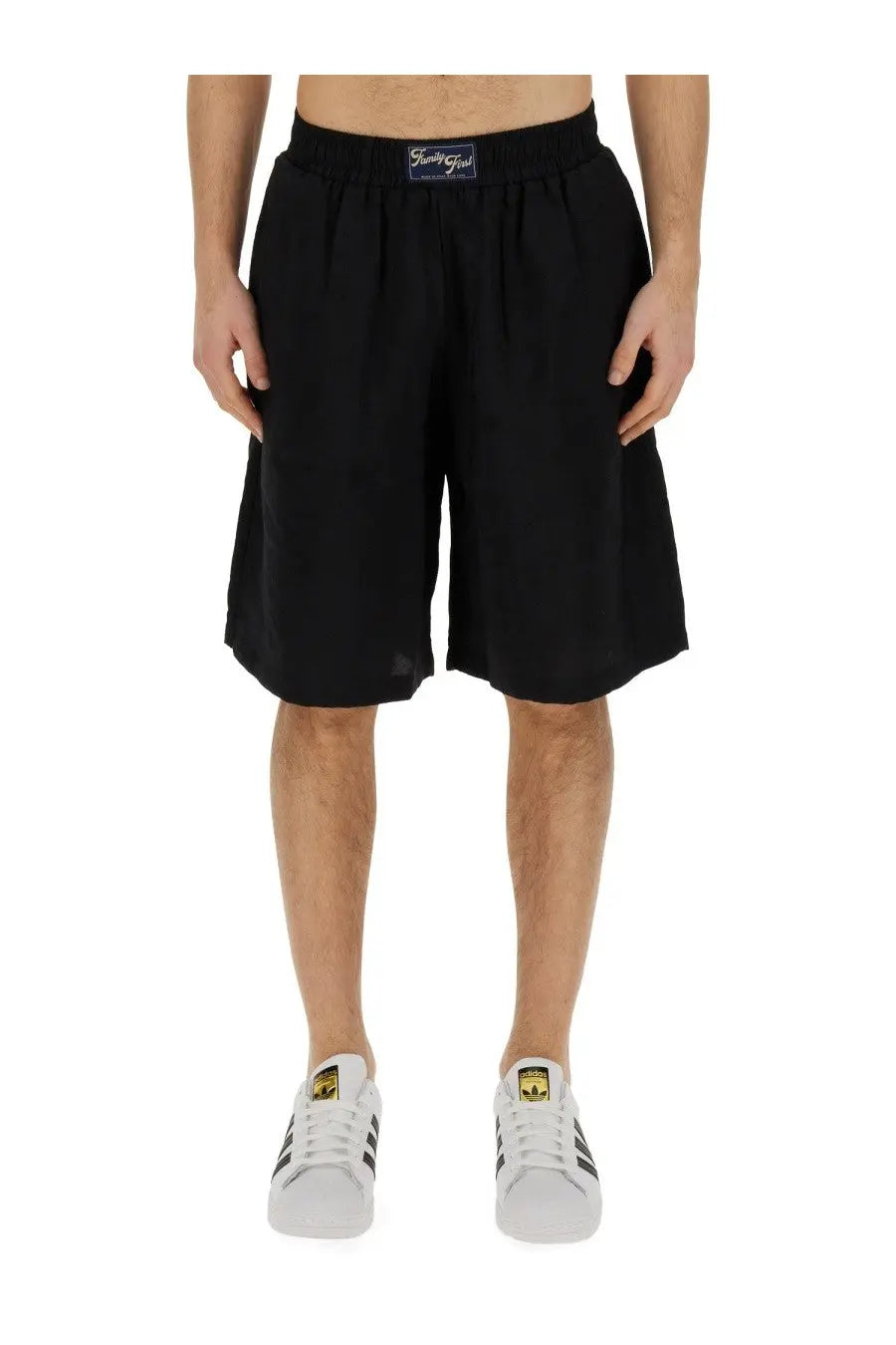 Family first men’s bermuda black loose-fitting shorts with elastic waistband and small blue label at the front