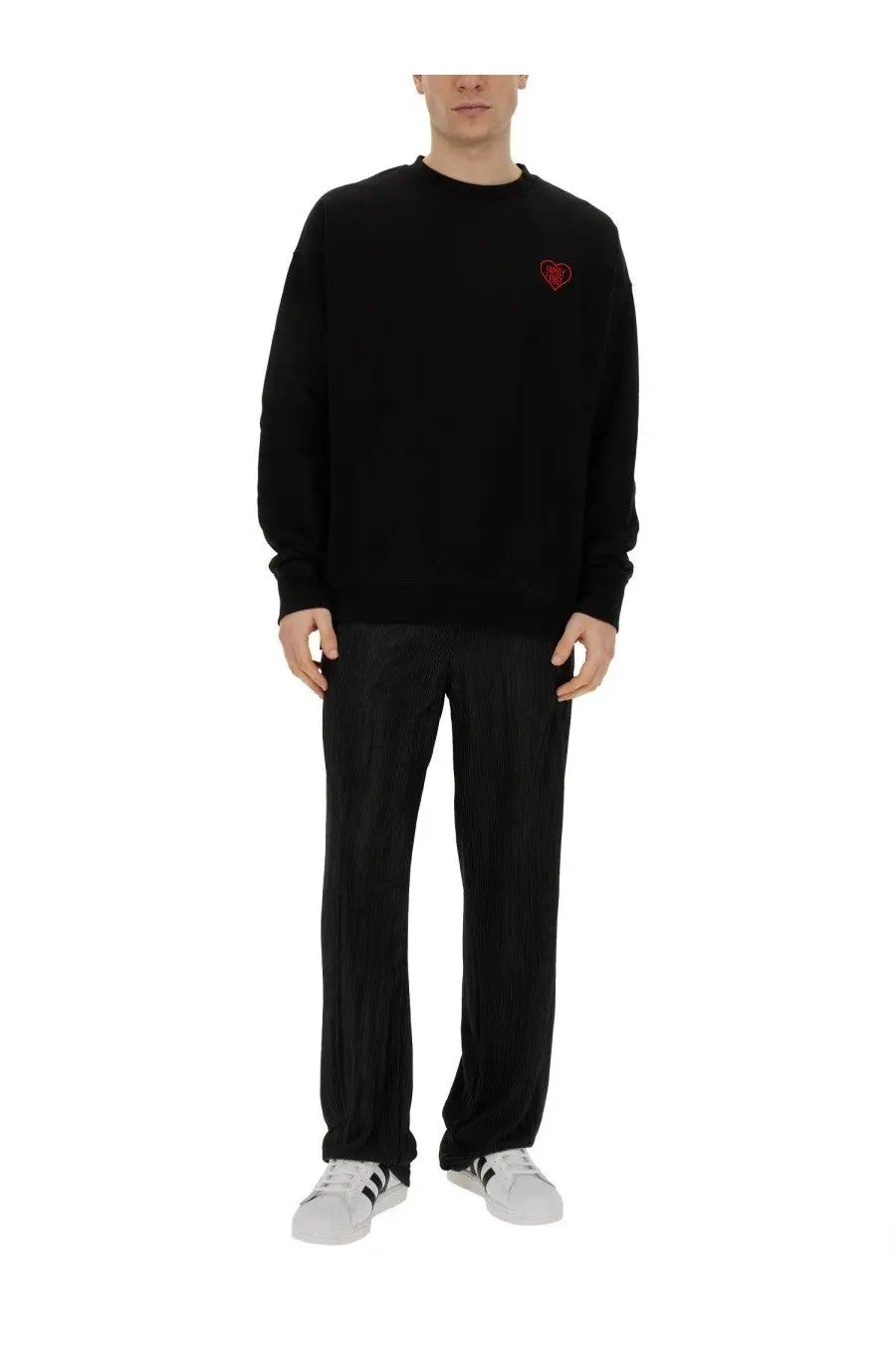 Family first men’s black long-sleeved sweatshirt with small red embroidered heart on left chest made of soft fabric