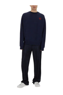 Family First men’s navy blue sweatshirt with long sleeves and small red embroidered heart on left chest