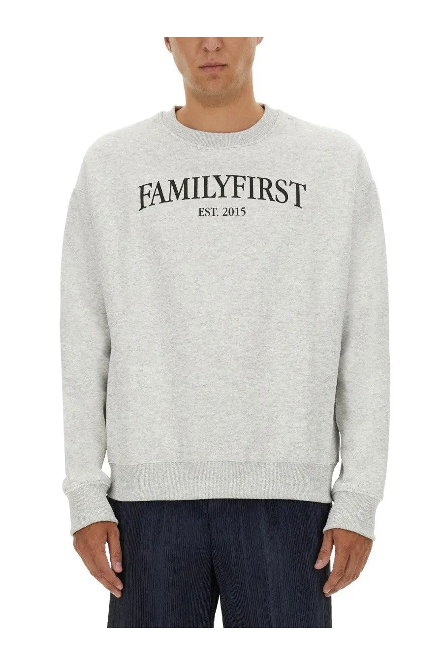 A heather gray crewneck sweatshirt for men with familyfirst est printed on the front in soft cotton blend fabric