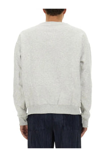 A heather gray family first men’s crewneck sweatshirt with ribbed cuffs and hem made of soft cotton blend