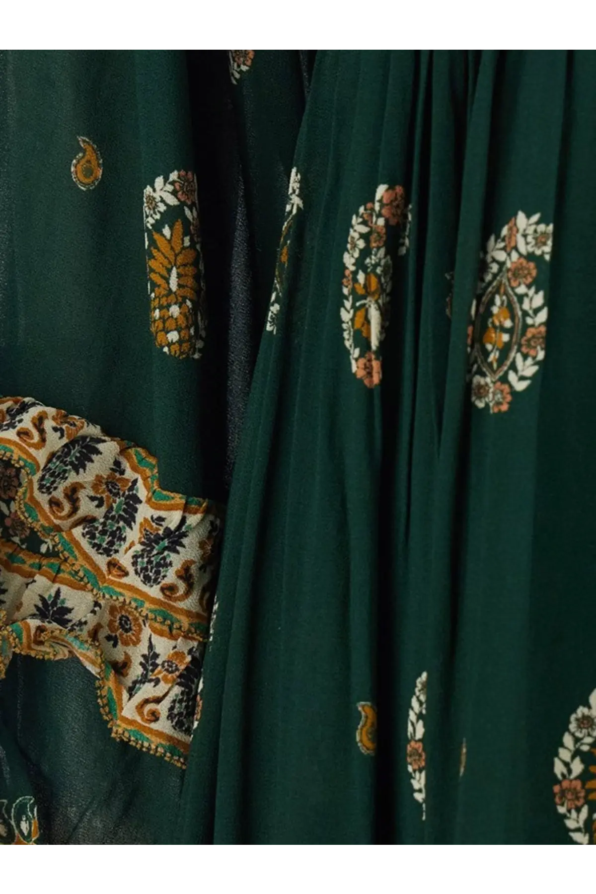 Farm Rio women’s Ayla maxi dress green featuring deep green fabric with intricate cream orange and brown paisley floral patterns