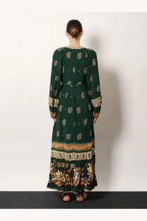Farm Rio women’s Ayla maxi dress green with long sleeves and intricate gold and beige floral patterns on hemline and cuffs