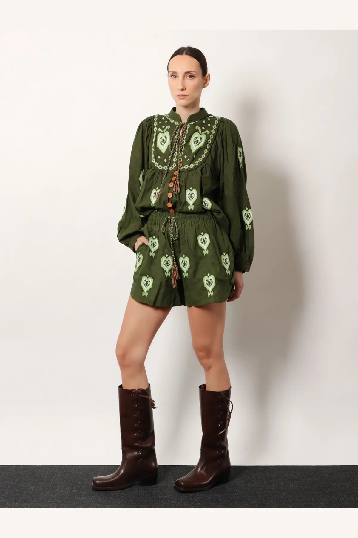 Farm rio women’s olive green embroidered romper with heart motifs and drawstring waist made of lenzing ecovero euroflax