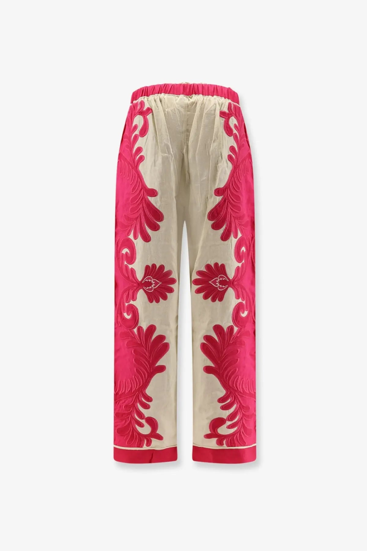 Cream-colored satin pants with bold pink floral embroidery and matching pink elastic waistband from farm rio