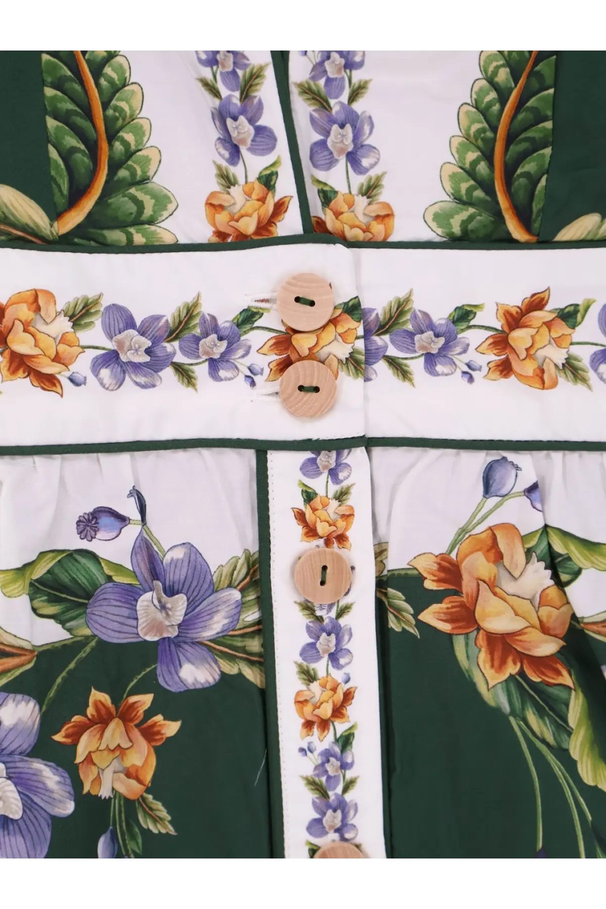 Farm rio women’s long cotton dress green featuring white and dark green floral fabric with purple orange flowers and wood buttons