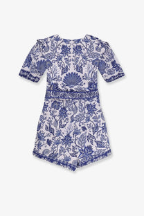Farm Rio women’s shell garden cotton jumpsuit in white with blue floral pattern, short sleeves, ruffled cuffs, and scalloped hem