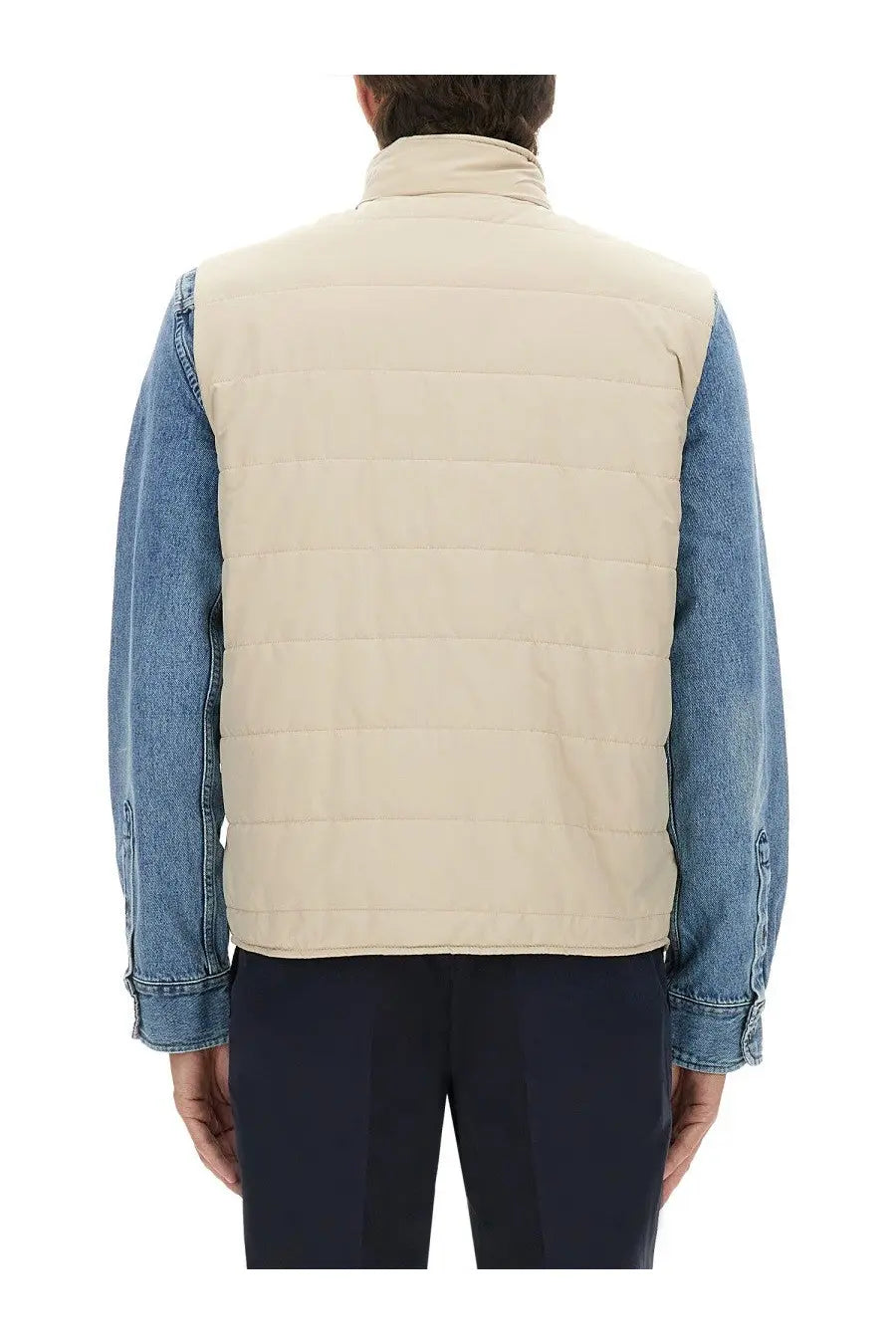 Beige quilted Fay men’s puffer vest with stand-up collar worn over blue denim sleeves