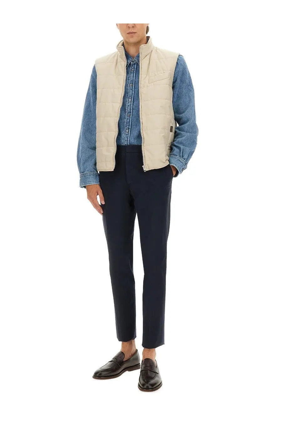 Beige Fay men’s quilted puffer vest made of insulated material worn over a denim shirt for casual layering