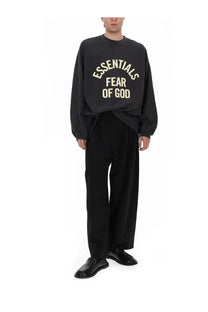 Black oversized cotton sweatshirt with cream essentials fear of god print on chest from fear of god essentials men