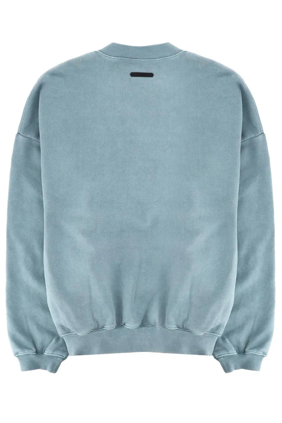 Fear of god essentials men’s light blue oversized sweatshirt with faded texture and black rectangular tag at neckline