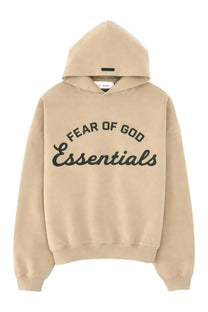 Beige fear of god essentials men’s felpa training 90s hoodie with black arched lettering across the chest