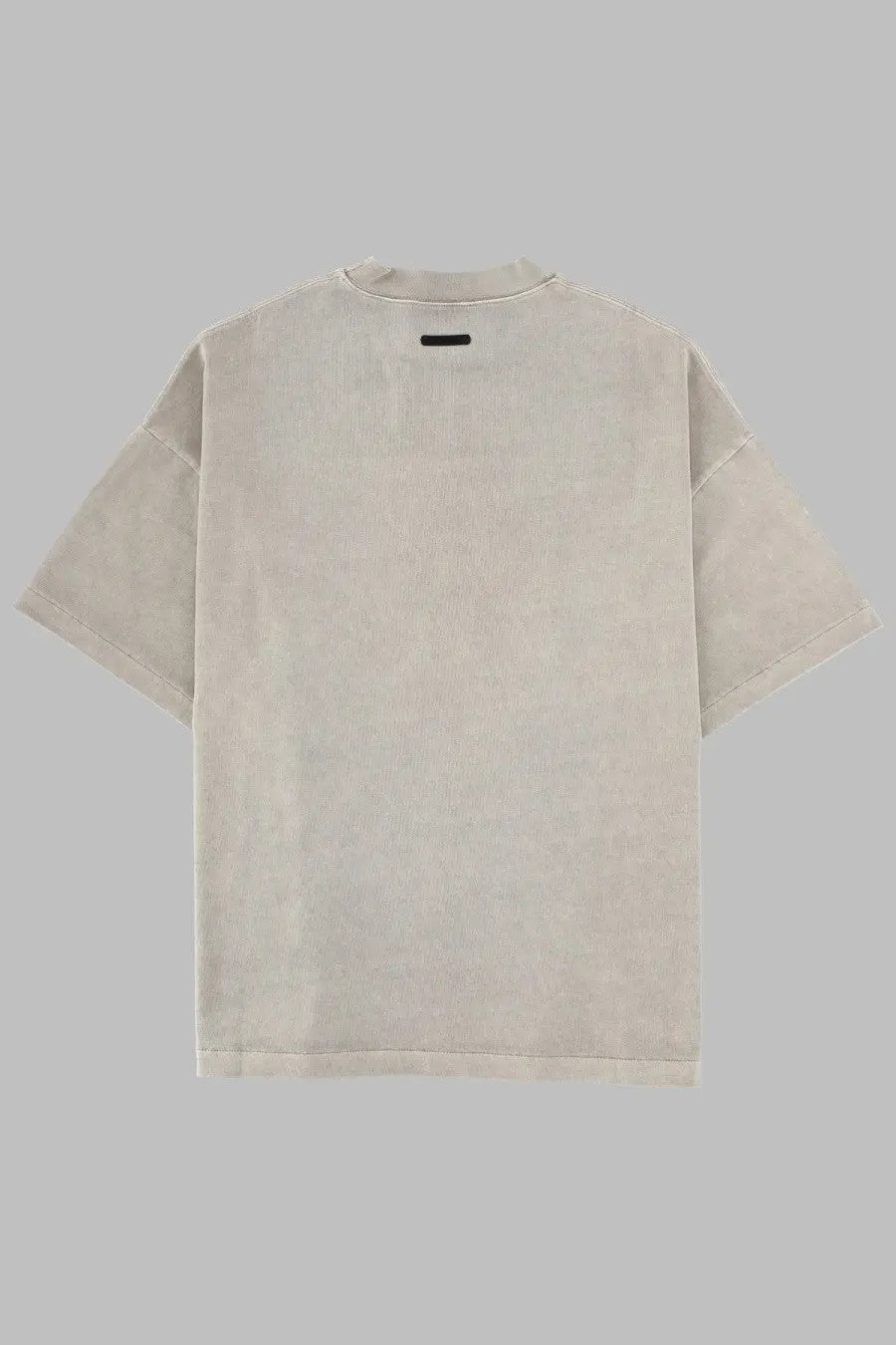 Beige oversized cotton t shirt with relaxed fit and subtle texture from fear of god essentials training 90s grey collection