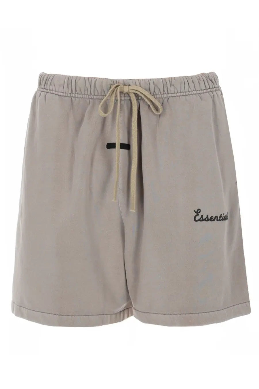 Beige fear of god essentials men’s athletic shorts with drawstring waistband and black embroidered essentials text