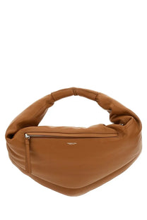 Tan leather hobo bag with soft sculpted shape and top zipper closure from Federico Cina tortellini midi collection