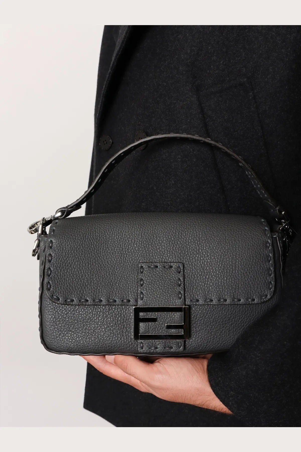 Fendi men’s baguette leather shoulder bag in grey with black textured leather and signature logo plaque