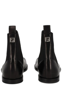 Black fendi men’s chelsea squared ff boot showing back with glossy leather and silver ff logo plaque