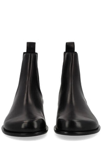 Fendi men’s black leather Chelsea squared FF boot with sleek minimalist design and rounded toe