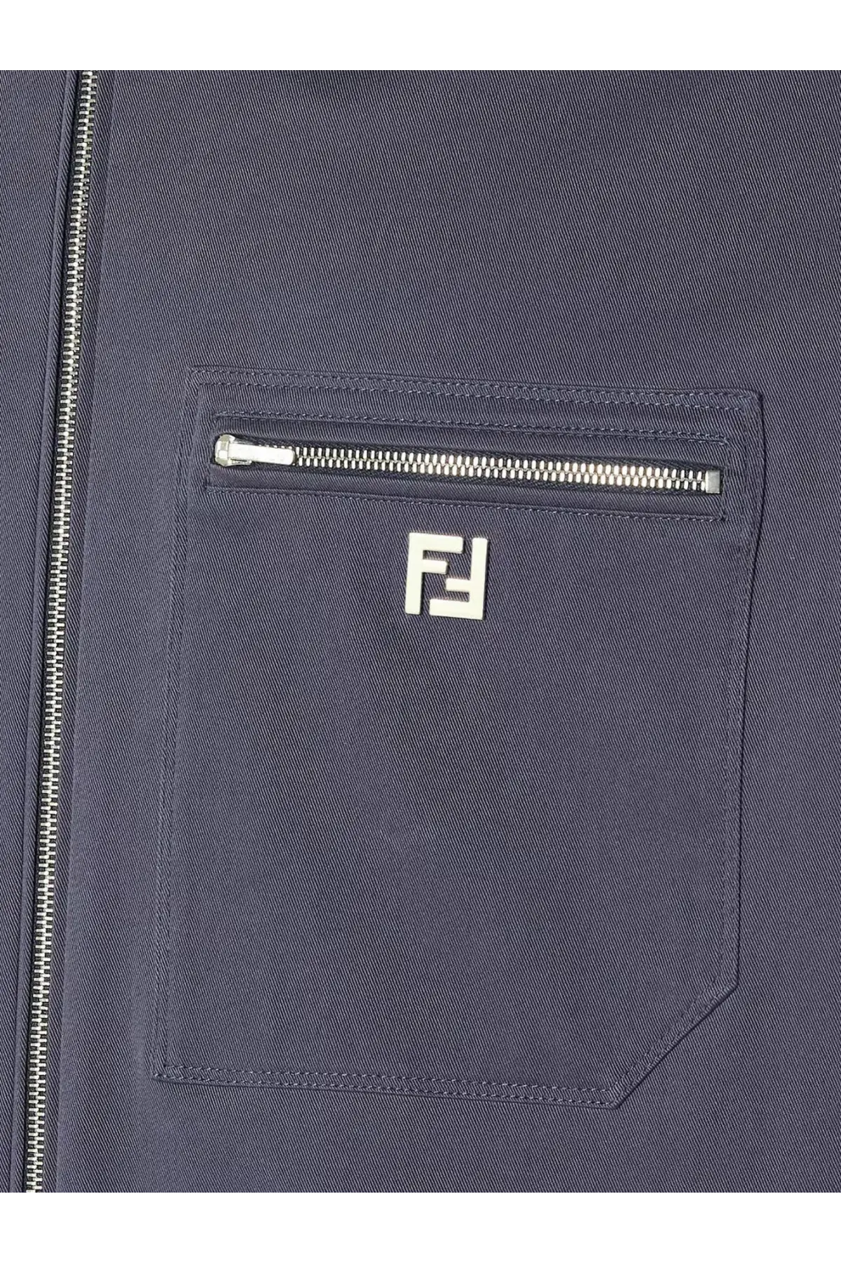 Dark blue fendi men’s cotton jacket pocket with silver zipper and white embroidered logo close-up view
