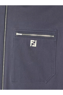 Dark blue fendi men’s cotton jacket pocket with silver zipper and white embroidered logo close-up view