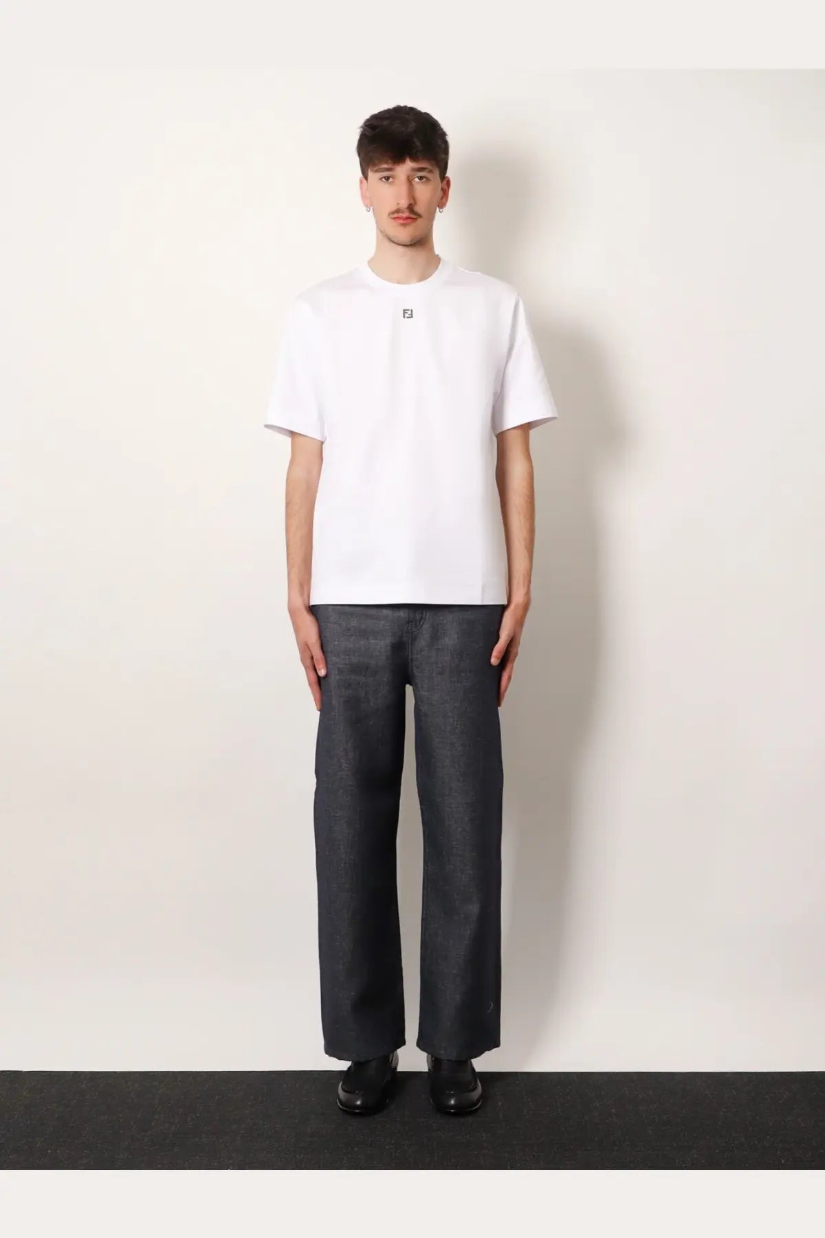 Fendi men’s white cotton short-sleeved t-shirt with a small black logo on the chest front side